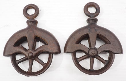 (2) Small cast iron pulleys