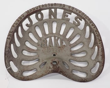 Jones Rake cast iron seat by The Plano Mfg Co.