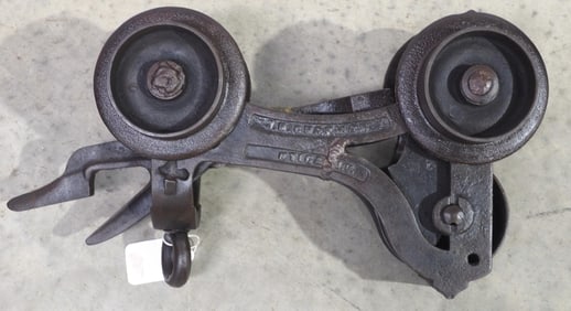 Powells Patent cast iron hay carrier