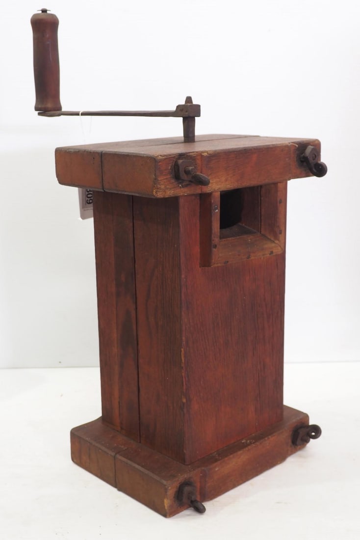 Hand-crank grinder with decorative nuts on bolts (1 of 2)