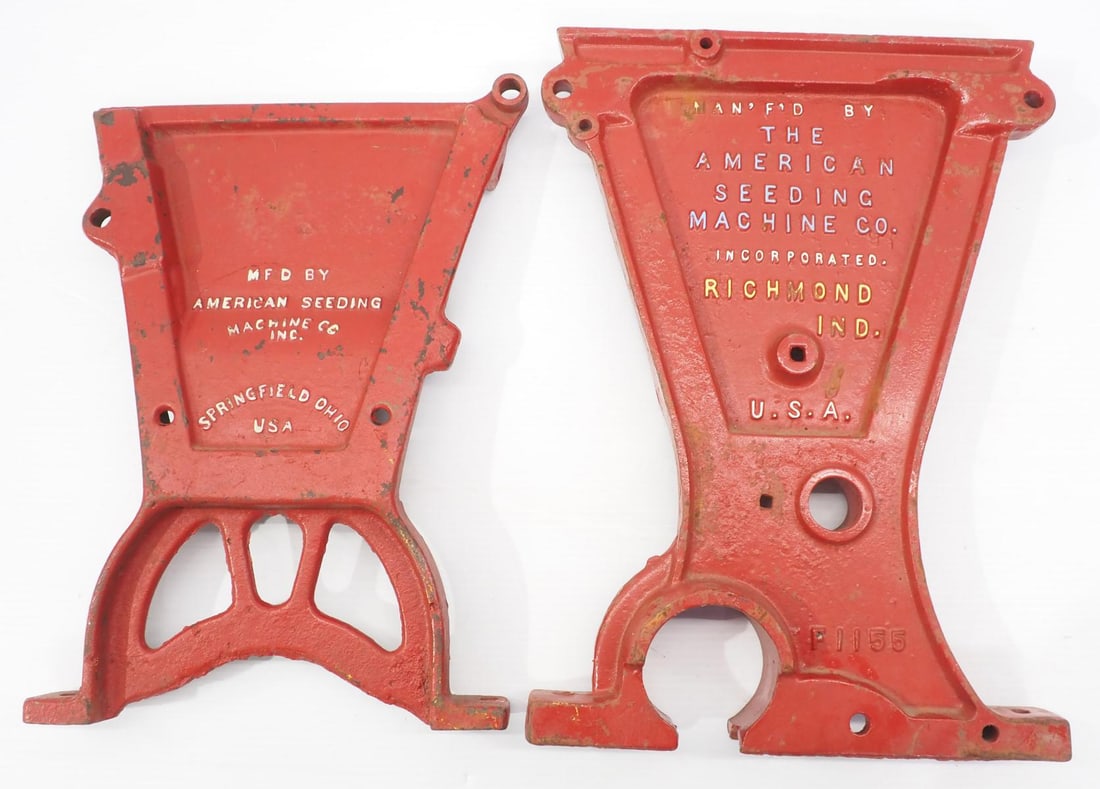 (2) Different cast iron planter box ends (1 of 2)