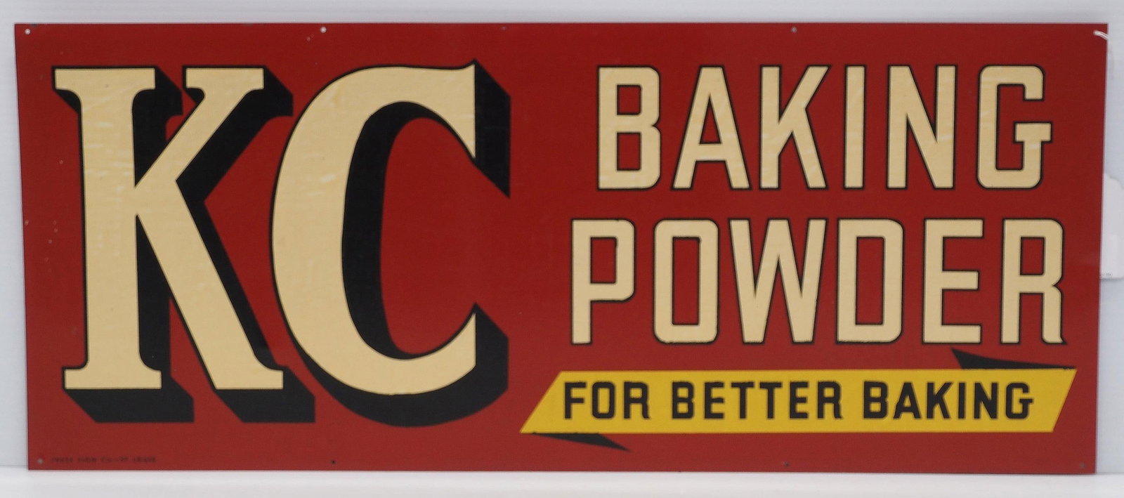 KC Baking Powder sign: 28"x12" DST KC Baking Powder sign, marked Press Sign Co. - Very Good