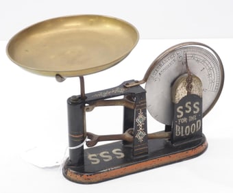 Small cast iron table-top scale