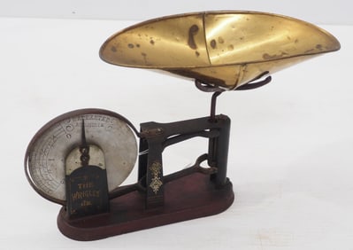 The Wrigley Jr cast iron tabletop candy scale