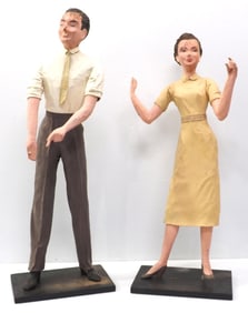 Man and woman papier mache display models