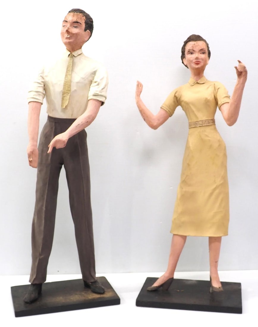 Man and woman papier mache display models: Man and woman papier mache store display models from the 1950's? with great detail and color, man is 33"H, woman is 31.5"H - Very Good, surfaces cracked on faces, some paint chipped from hair * * Not