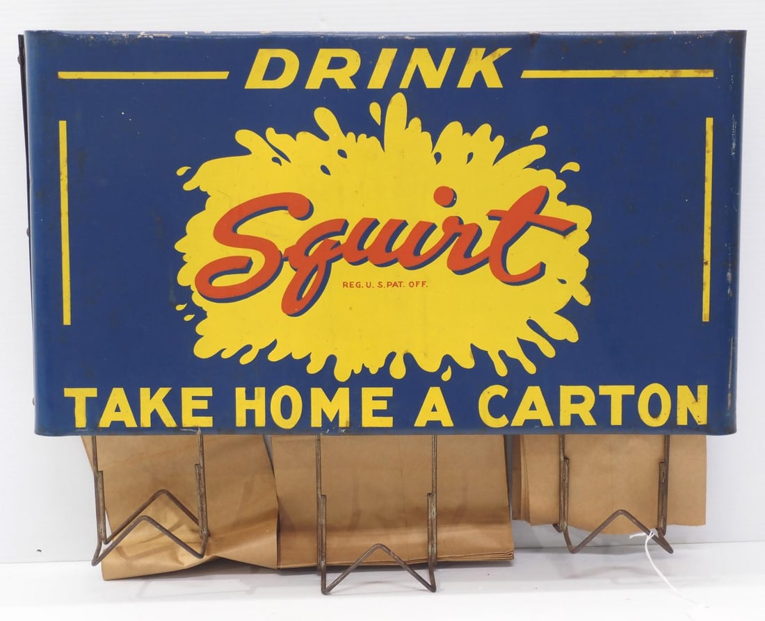 Hanging country store paper bag dispenser: Hanging country store paper bag dispenser advertising Squirt drink, 24"x5.5"x19"H - Good