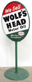 Wolf's Head Motor Oil sign