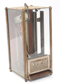 Coin-operated gum or candy vendor