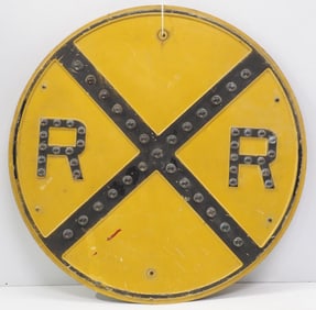 Railroad sign with cat eye reflectors