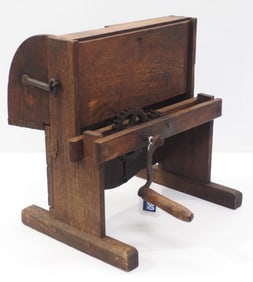 Early wooden hand-crank vegetable slicer