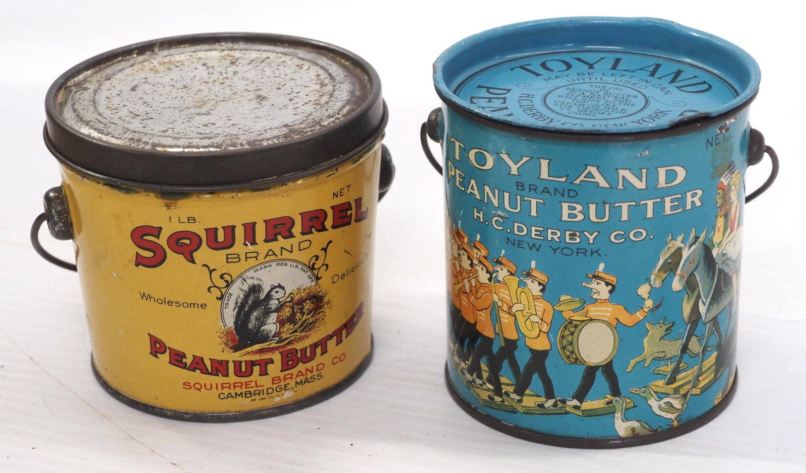 (2) 1-lb peanut butter tins: (2) 1-lb peanut butter tins: Toyland / Squirrel bucket