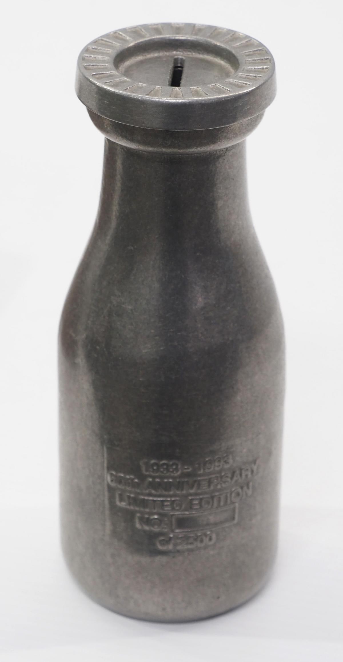 Reiter's 60th Anniversary coin bank: Reiter's 60th Anniversary Limited Edition metal bottle-shaped coin bank