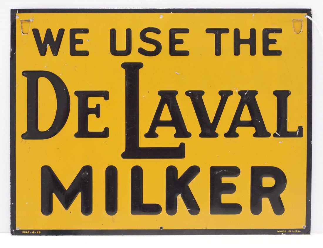 We Use the DeLaval Milker sign (1 of 4)