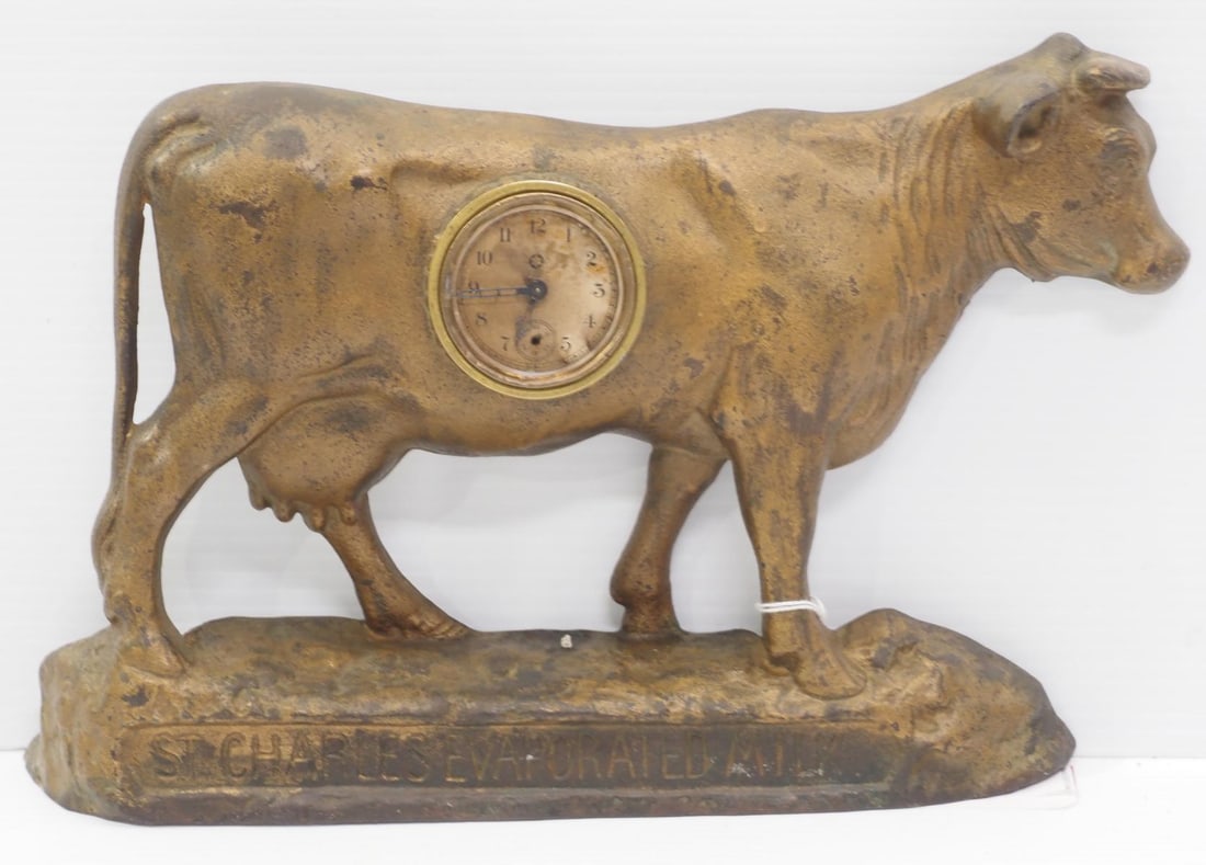 Cow-shaped statue with inset clock (1 of 2)