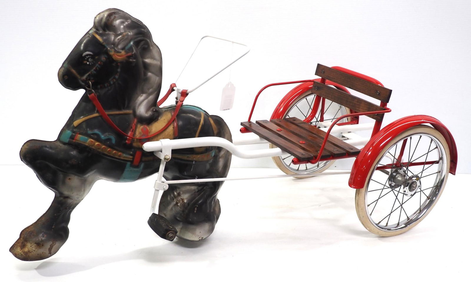 Mobo tin horse: Mobo tin horse with some original paint with restored cart, 41"L overall - Good, some rust on horse