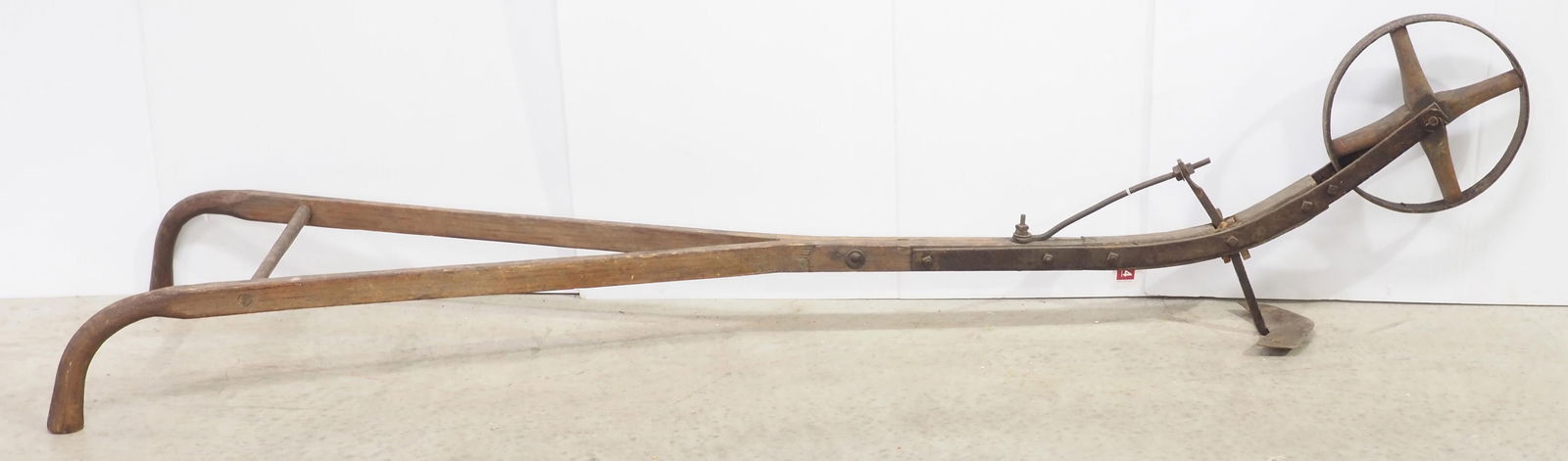 Primitive cultivator with wooden spokes (1 of 2)