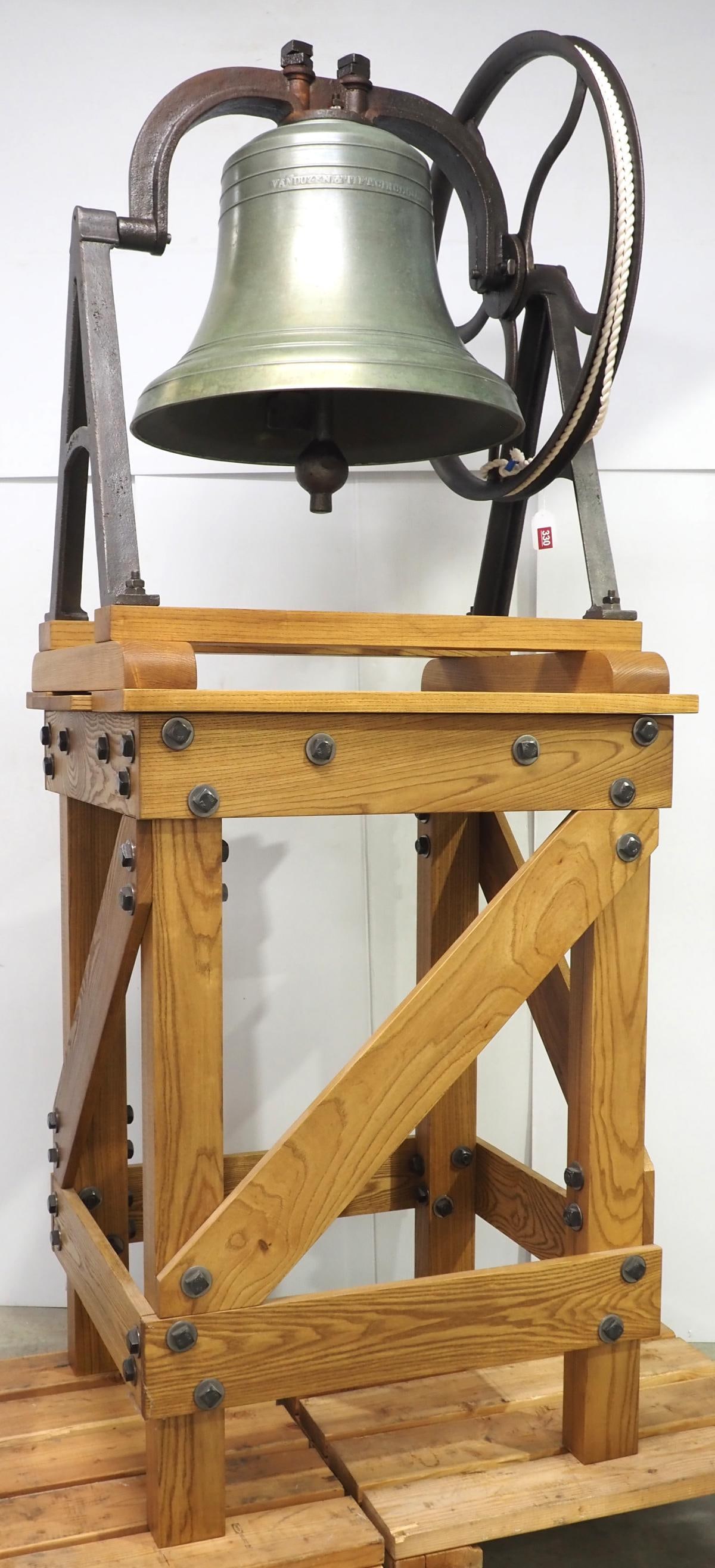 Bronze bell with cast iron yoke and stand: 24"dia. bronze bell marked Buckeye Bell Foundry 1887 and Vanduzen & Tift Cincinnatti with cast iron yoke and stand, plus wooden stand, with stand it measures approx. 87"H - bell & yoke all original, s