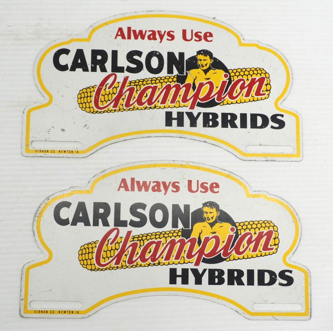 (2) Carlson Champion Hybrids license plate toppers: (2) Carlson Champion Hybrids SST license plate toppers, marked Vernon Co.