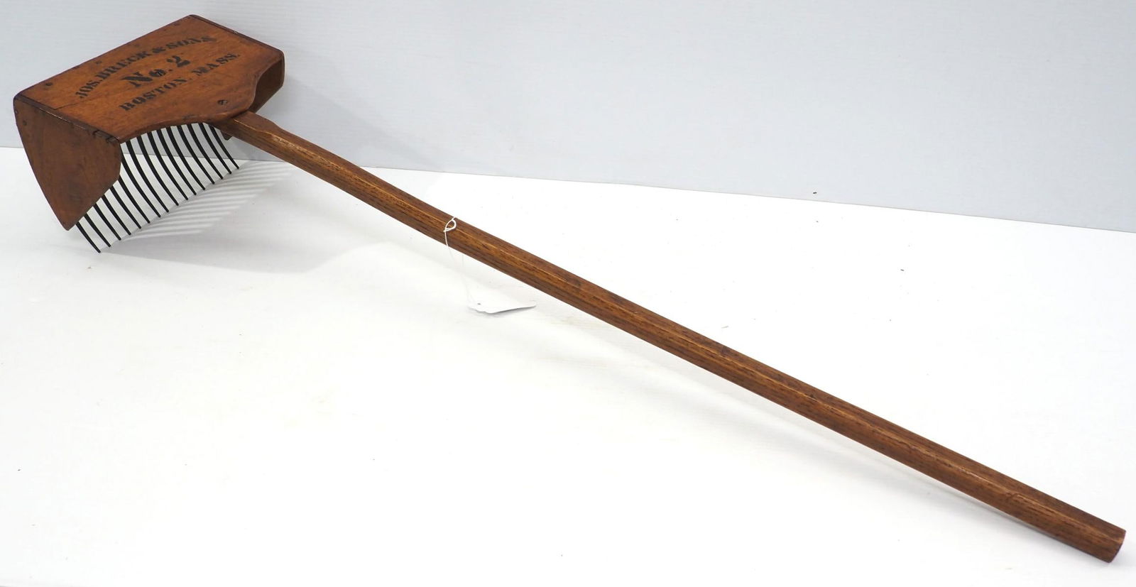 Early wooden, long-handle berry picker: Early wooden, long-handle berry picker marked No.2 Jos. Breck & Sons, Boston, Mass., 44"L