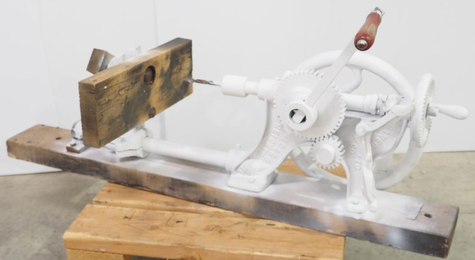 Wall-mount cast iron, hand-crank post drill (1 of 2)