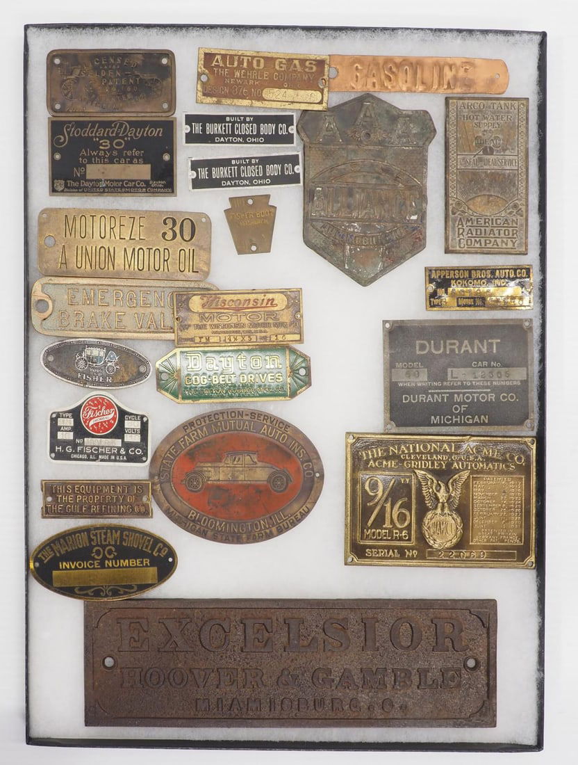 Assorted brass plates: Assorted brass plates including Alliance Automobile Club, Dayton, Excelsior, Durant, American Radiator Co. and more, frame measures 12"x16"