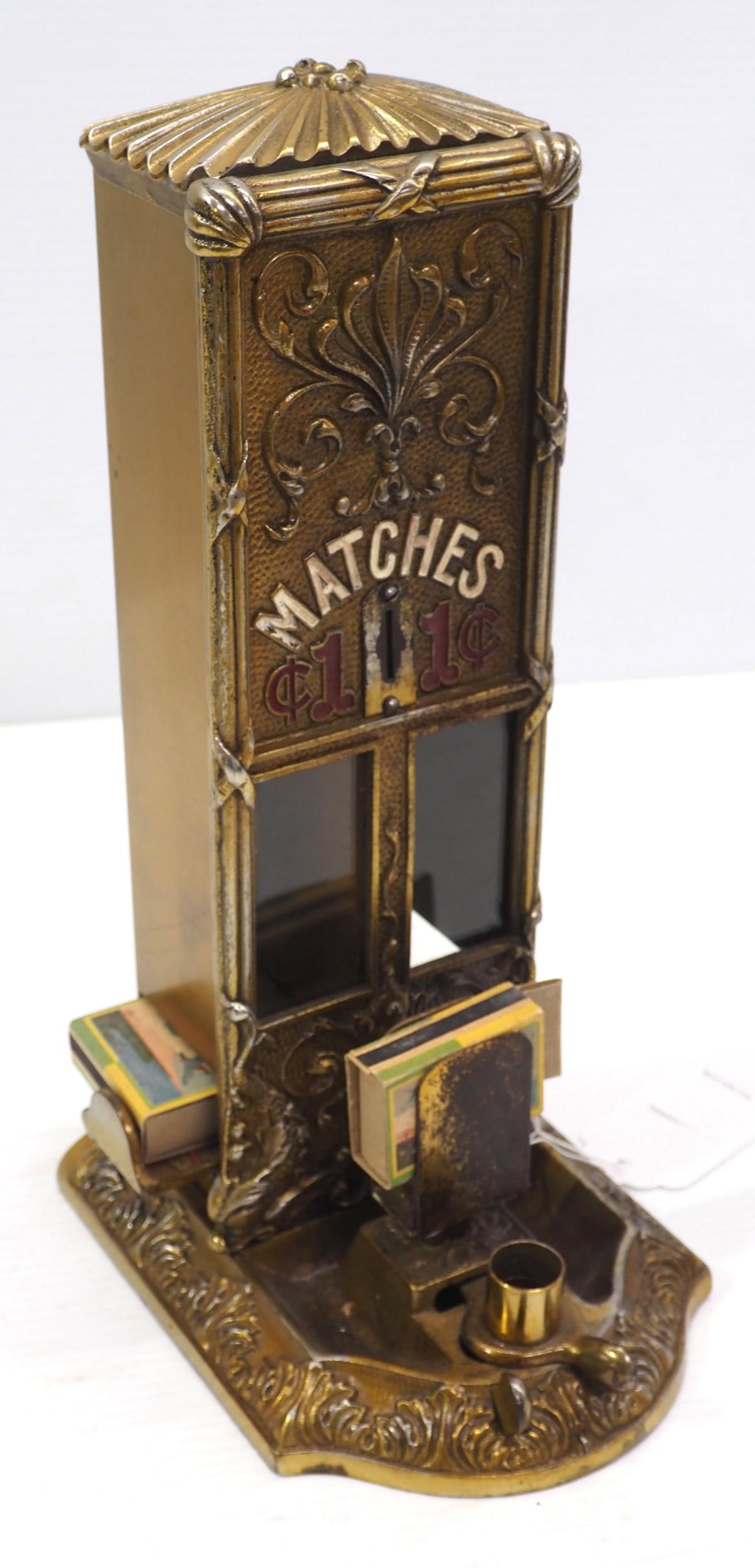 Northwestern Novelty Co. 1-cent matchbox vendor (1 of 2)