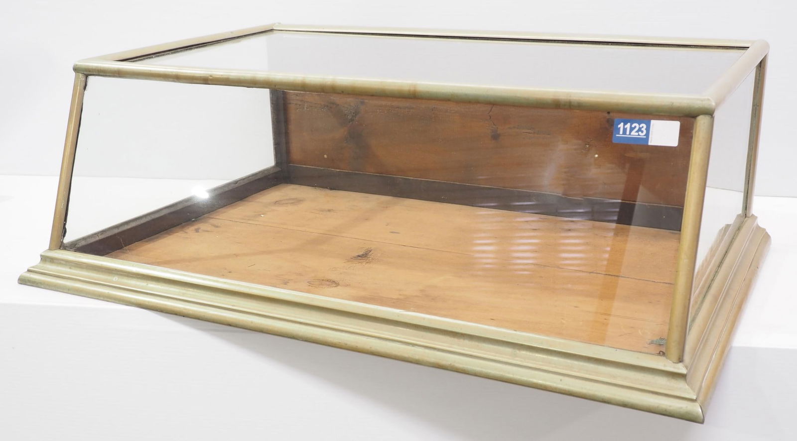 Slant front metal and glass countertop showcase (1 of 2)