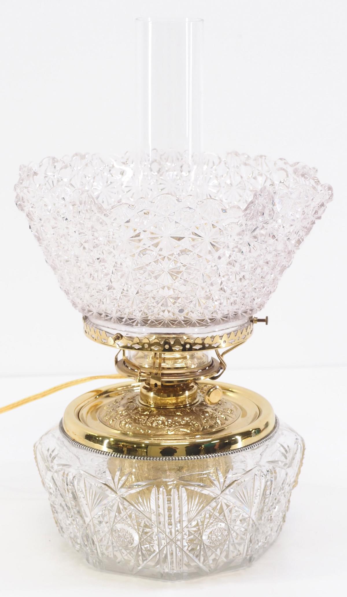 Electrified Cut-Glass Oil Lamp with EAPG Star and Button Ruffled Shade: Electrified Cut-Glass Oil Lamp with EAPG Star and Button Ruffled Shade, can go back to original oil Condition NOTICE! VERY IMPORTANT! Chupp Auctions is pleased to issue an opinion on any lot; the abse