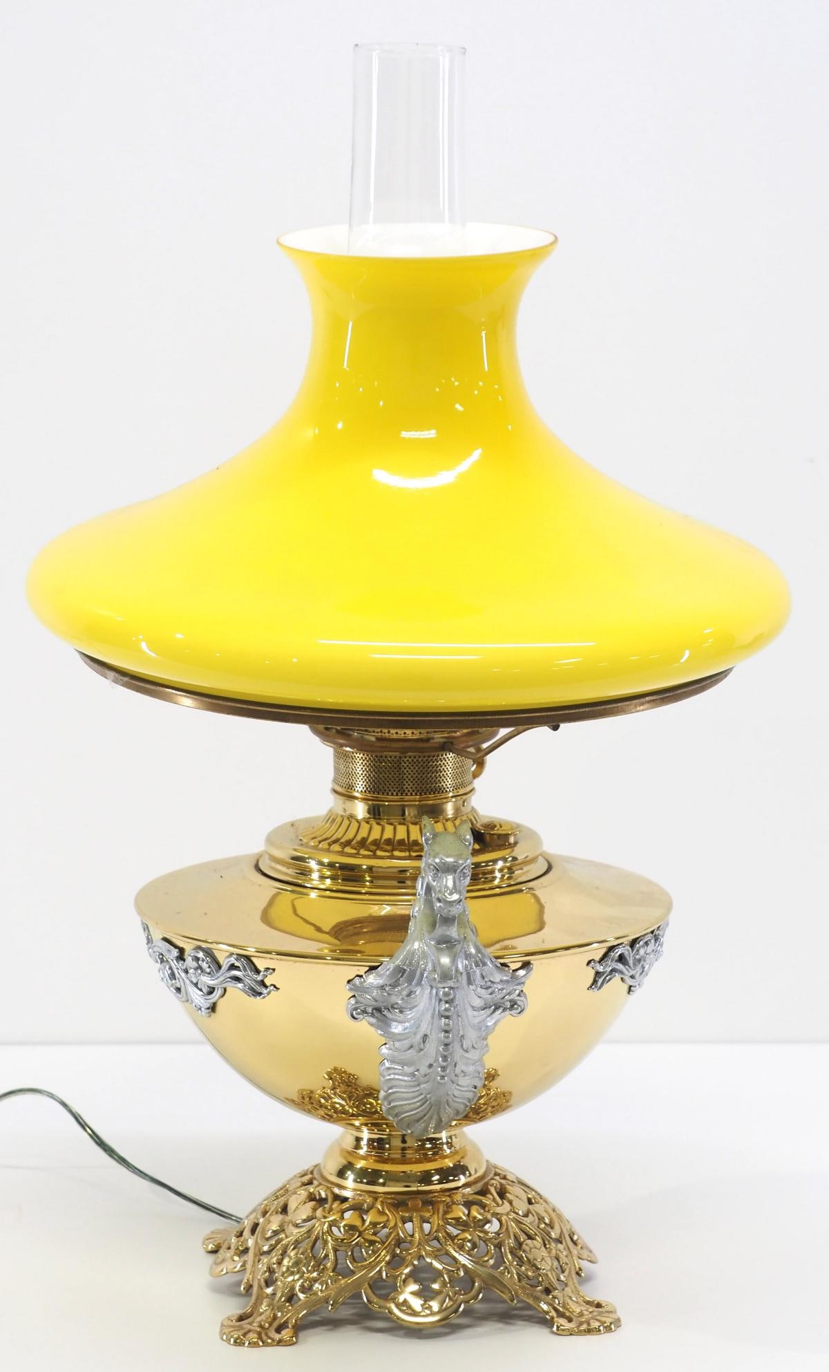 Double-Handle Dragon Tank Lamp: Double-Handle Dragon Tank Lamp with Yellow Cased Tam Shade, Brass and Cast Brass with Polished Nickel Embellishments Condition NOTICE! VERY IMPORTANT! Chupp Auctions is pleased to issue an opinion on