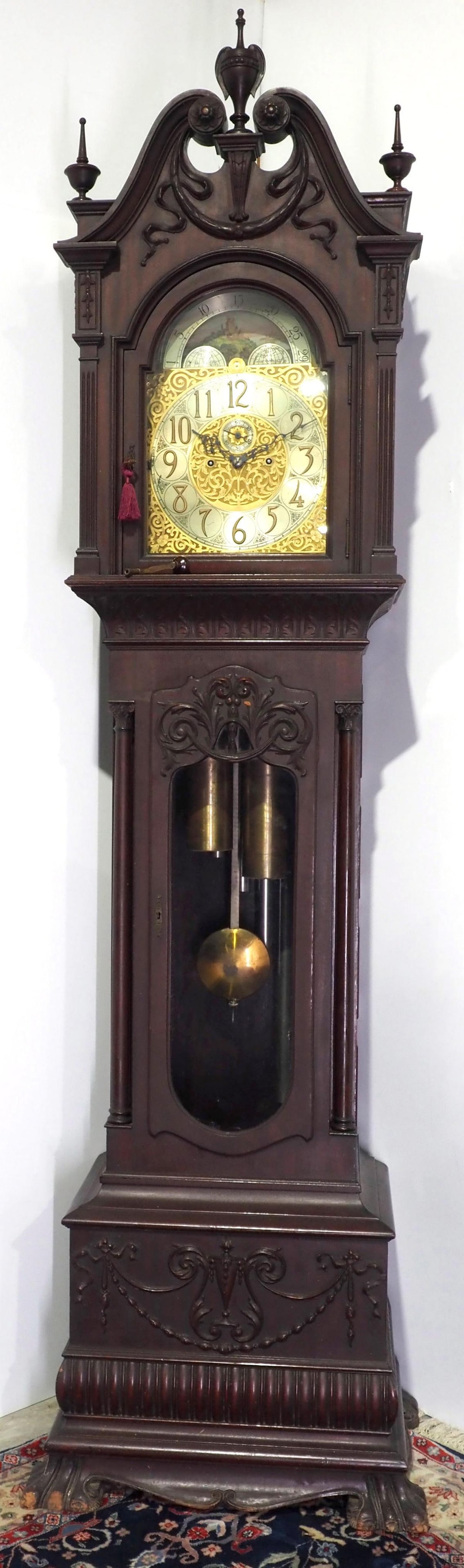 Colonial Mfg. Co. Fancy Tall Case Grandfather Clock: Colonial Mfg. Co. Fancy Tall Case Grandfather Clock with Carved Broken Arch Crest, Claw Feet, Moveable Moon Phase Dial and 5 Tubes. Featured in Tran Duy Ly's Long Case Clocks book, pg 321. This was th