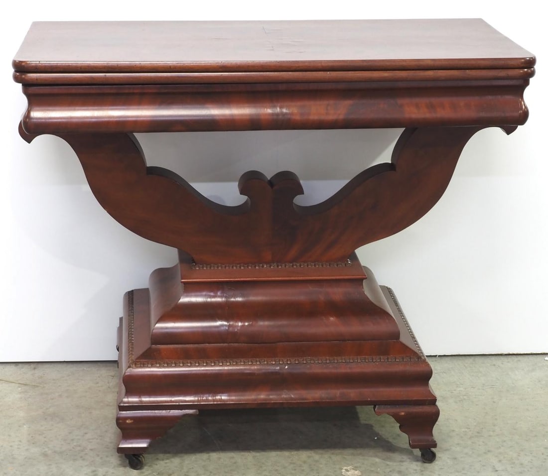 Early Mahogany Veneer Game Table: Early Mahogany Veneer Game Table with Lyre Base and Fold-out Top Condition NOTICE! VERY IMPORTANT! Chupp Auctions is pleased to issue an opinion on any lot; the absence of a condition report does not 