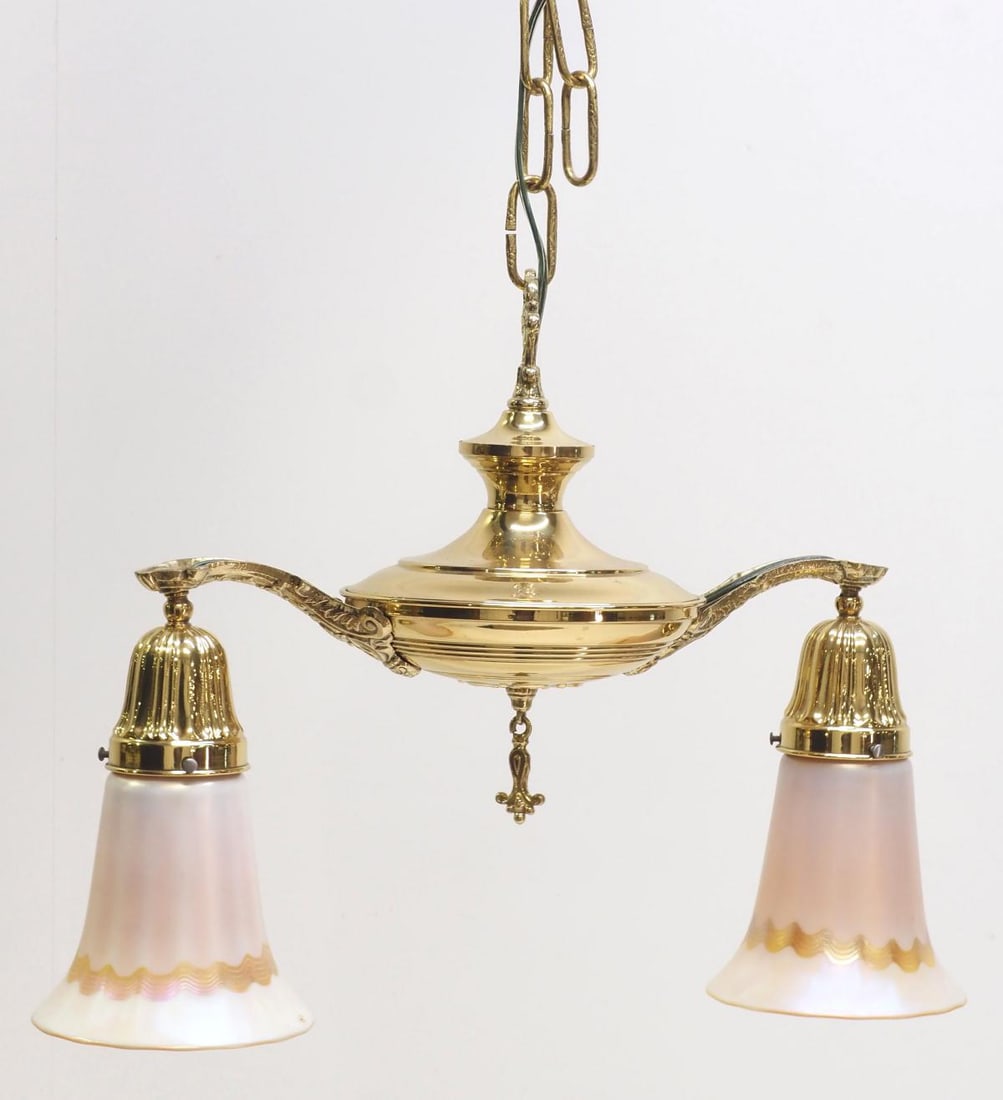 Hanging Light Fixture with 2 Quezal Art Glass Shades: Polished Brass Hanging Light Fixture with 2 Signed Quezal Gold Aurene Art Glass Shades Condition NOTICE! VERY IMPORTANT! Chupp Auctions is pleased to issue an opinion on any lot; the absence of a cond