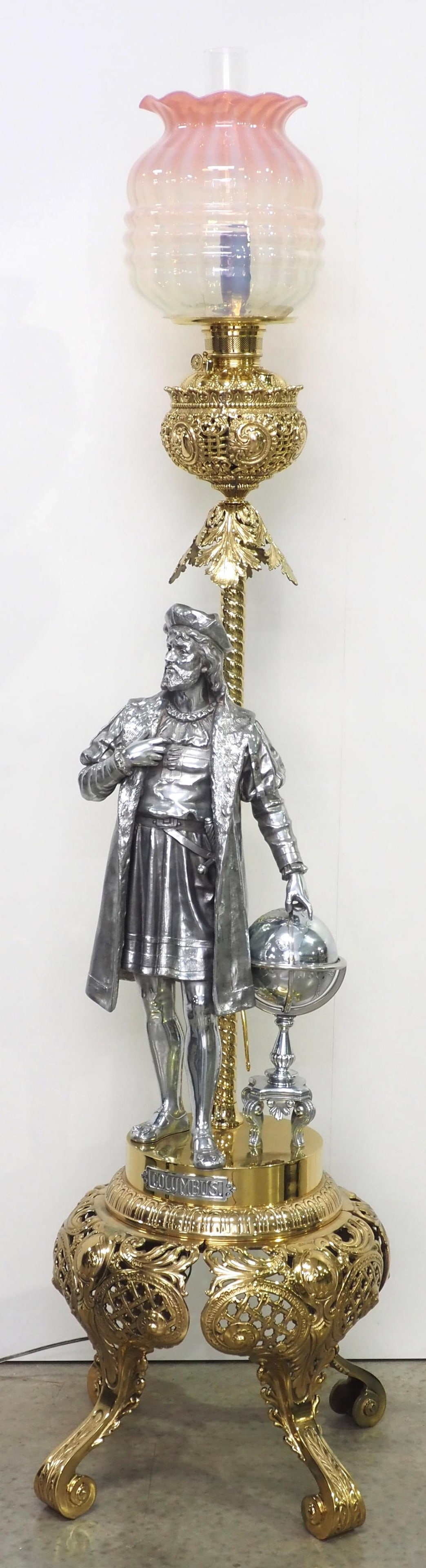 Fabulous 19th Century Victorian Christopher Columbus Figural Floor Lamp: Fabulous 19th Century Victorian Polished Cast Brass & Spelter Christopher Columbus Figural Electrified Kerosene Floor Lamp, with Pink Opalescent Ruffled Shade. Depicted after Eurtrope Boureet (Fre