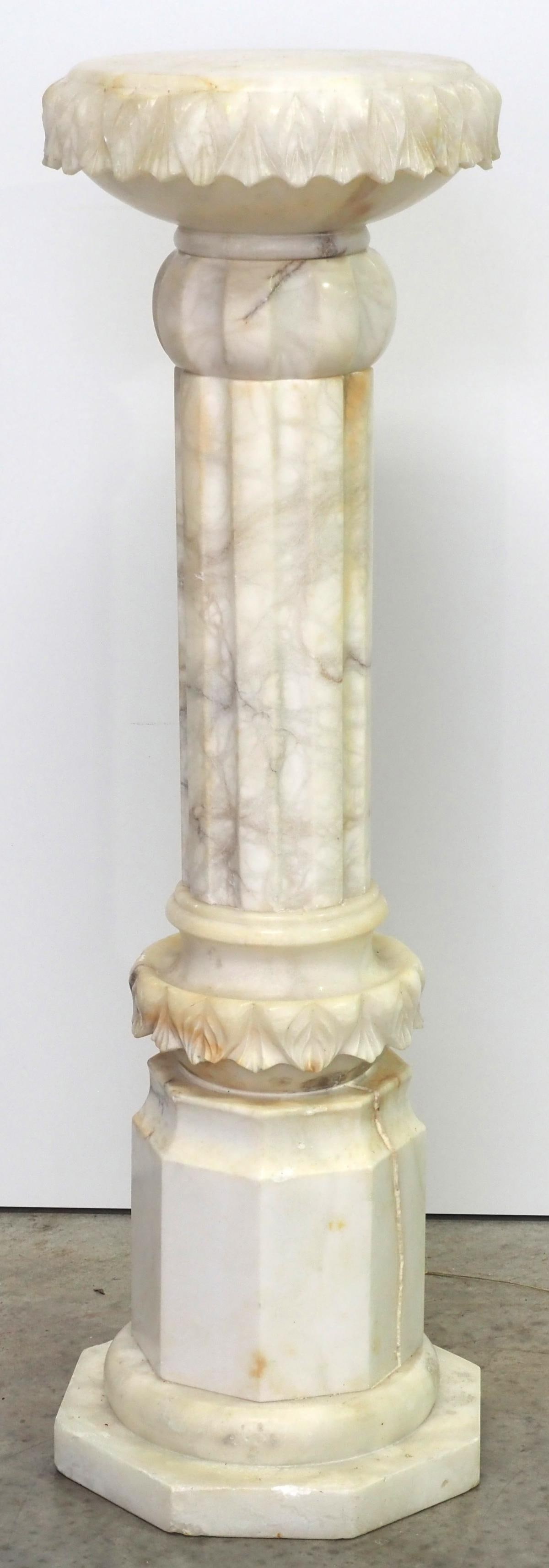 2-Pc Marble Carved Pedestal: 2-Pc Marble Carved Pedestal - filled crack in base Condition NOTICE! VERY IMPORTANT! Chupp Auctions is pleased to issue an opinion on any lot; the absence of a condition report does not indicate that 