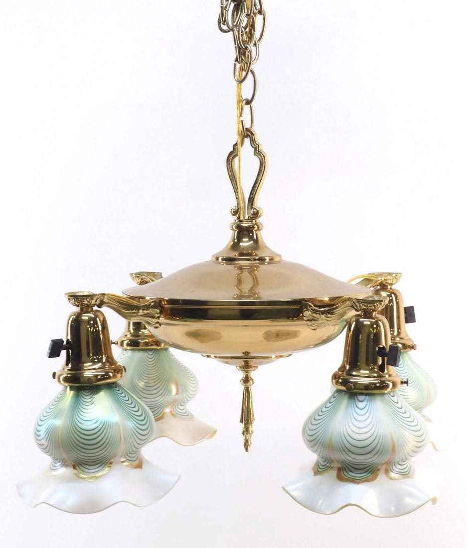 Polished Brass Chandelier with 4 Gold Aurene Art Glass Shades: Polished Brass Chandelier with 4 Pulled Feather Gold Aurene Art Glass Shades Condition NOTICE! VERY IMPORTANT! Chupp Auctions is pleased to issue an opinion on any lot; the absence of a condition repo