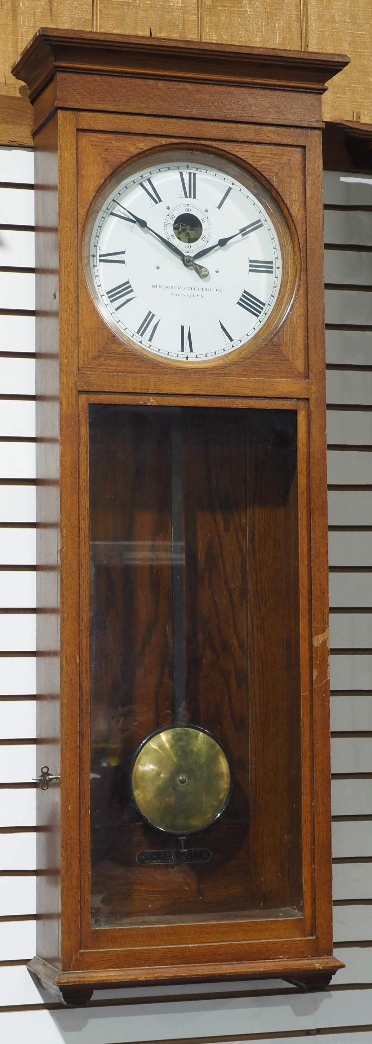 Stromberg Electric Co. Chicago Model 40 Oak Master Wall Clock: Stromberg Electric Co. Chicago Model 40 Self-Winding Oak Master Wall Clock with Brass Pendulum and Sub Seconds Dial Condition NOTICE! VERY IMPORTANT! Chupp Auctions is pleased to issue an opinion on a