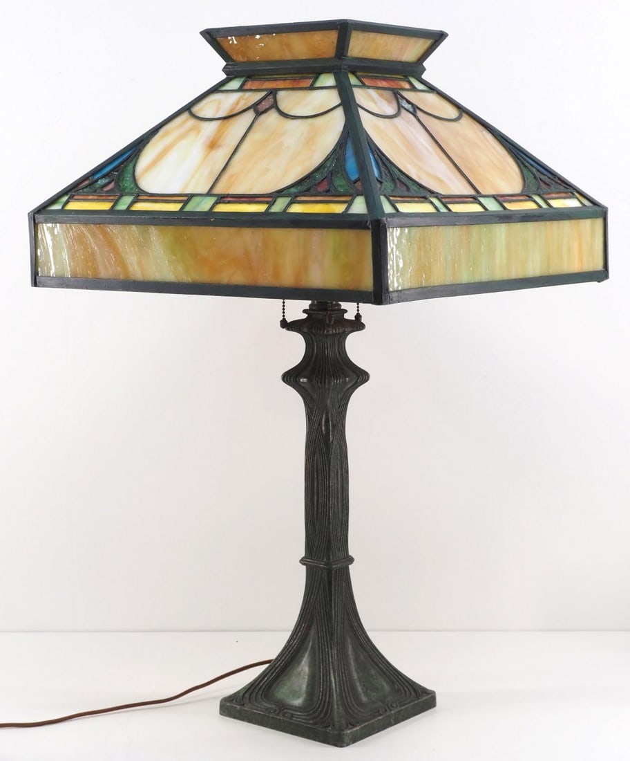 Oversized Handel Table Lamp with Leaded Glass Shade: Oversized Handel Table Lamp with Leaded Glass Shade & Original Verde Patinaed Base Condition NOTICE! VERY IMPORTANT! Chupp Auctions is pleased to issue an opinion on any lot; the absence of a cond