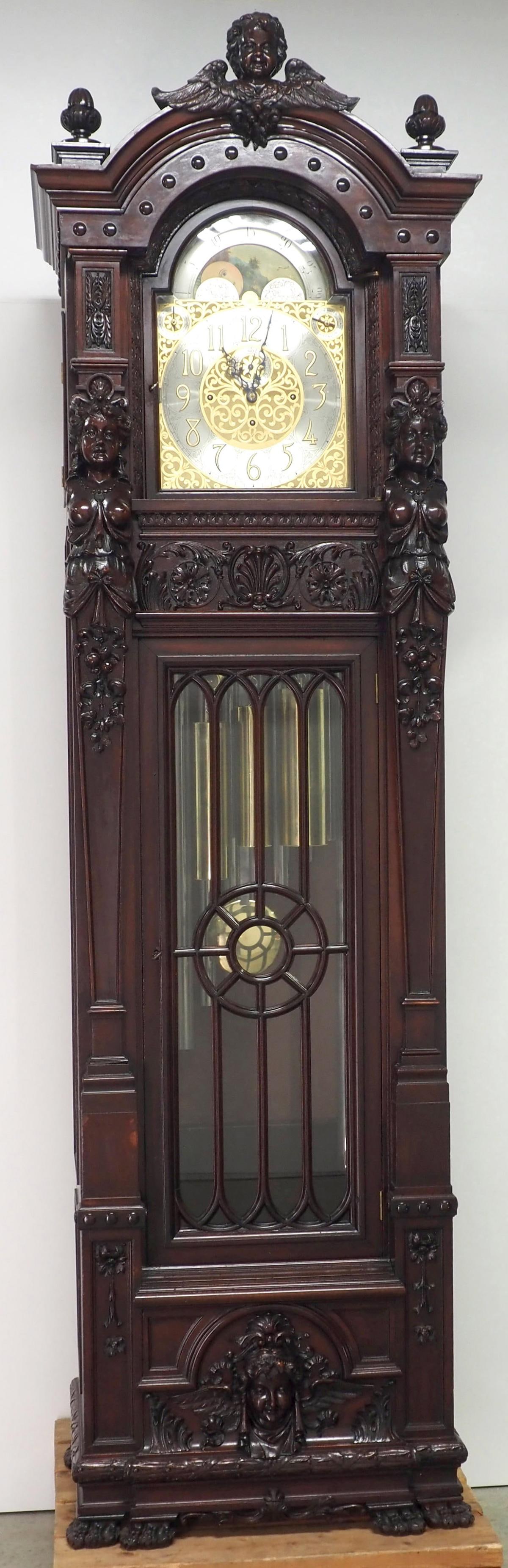 Monumental Mahogany Tall Case 9-Tube Grandfather Clock: Monumental Mahogany Tall Case 9-Tube Grandfather Clock with Carved Women and Winged Putti, Castle, Ship & Moon Dial, Claw Feet, Whittington & Westminster Chime. Case attributed to R.J. Horner.