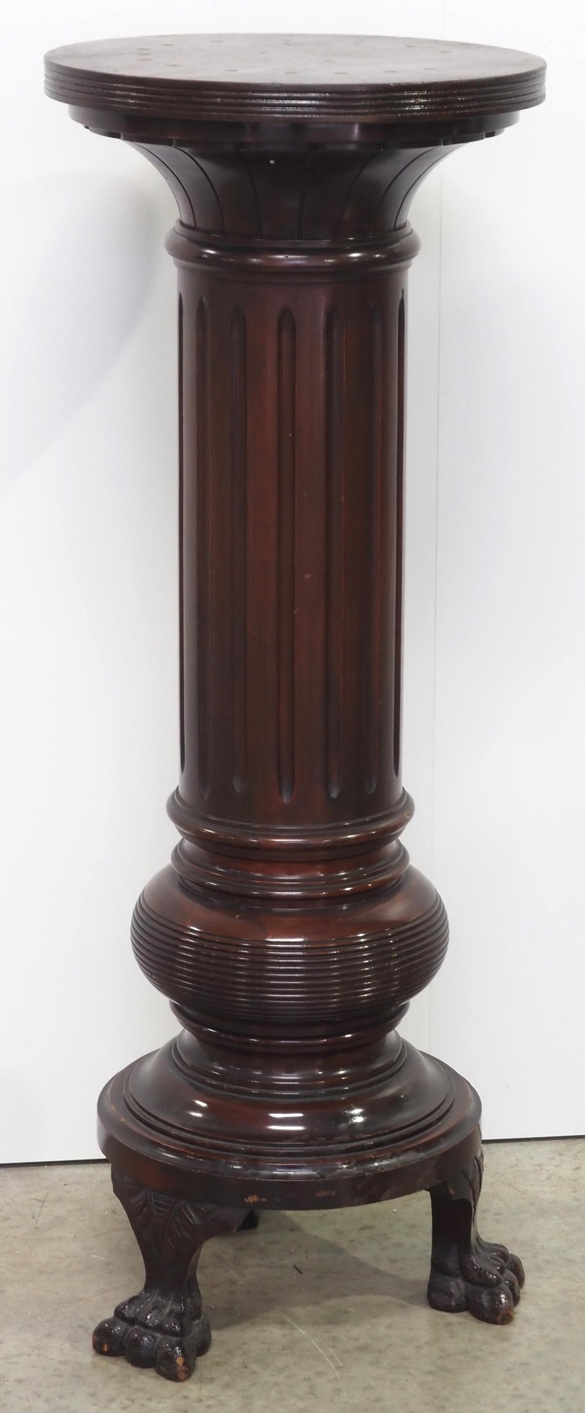 Victorian Mahogany Triple Claw Foot Fluted Pedestal: Victorian Mahogany Triple Claw Foot Fluted Pedestal Condition NOTICE! VERY IMPORTANT! Chupp Auctions is pleased to issue an opinion on any lot; the absence of a condition report does not indicate that