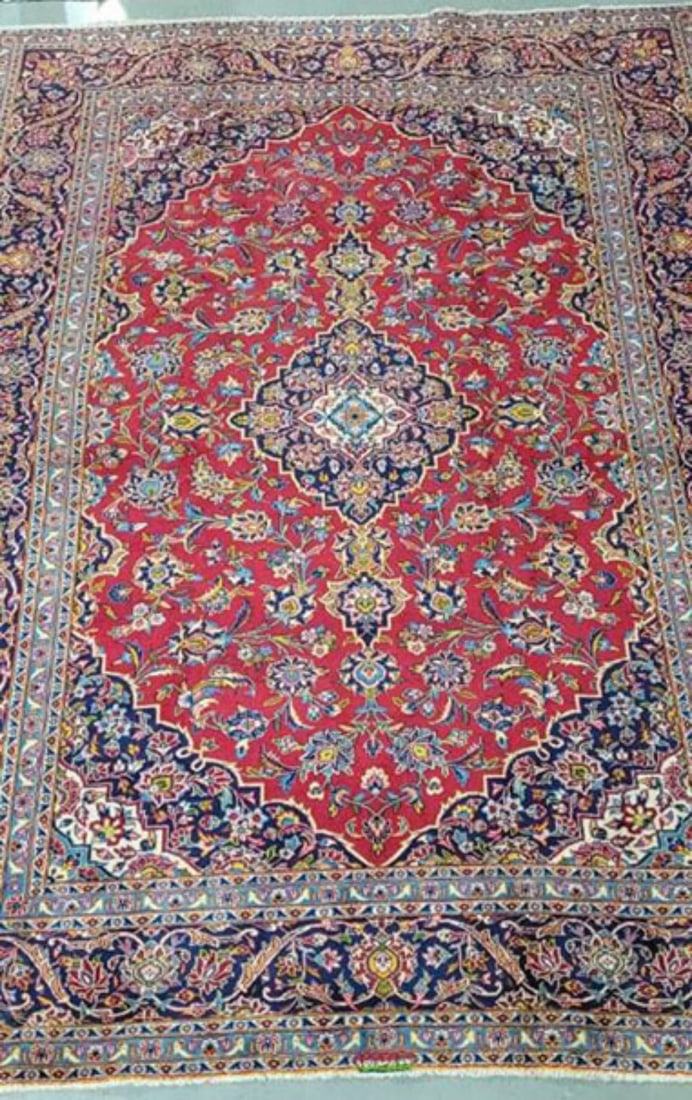 Kashan Room-size Hand Knotted Oriental Rug: Kashan Room-size Hand Knotted Oriental Rug, 11'4" x 8' Condition NOTICE! VERY IMPORTANT! Chupp Auctions is pleased to issue an opinion on any lot; the absence of a condition report does not indicate t