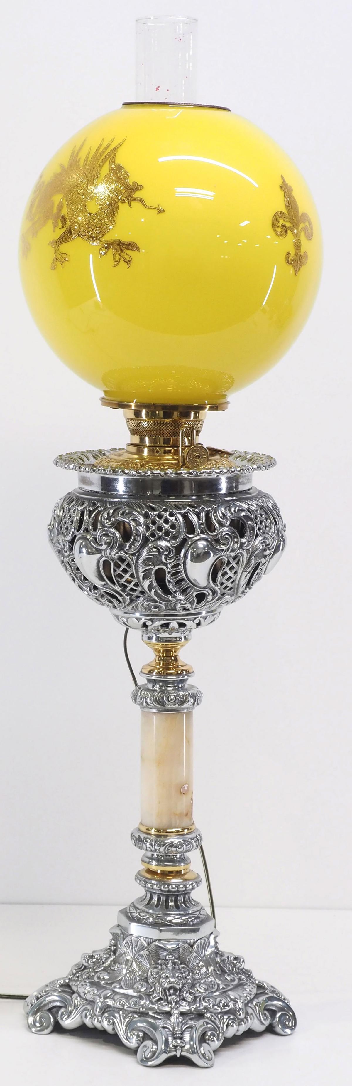 Victorian Banquet Lamp with Yellow Cased Ball Globe: Victorian Polished Nickel & Marble Stem Banquet Lamp with Yellow Cased Ball Globe and Gold Overlay Dragon, Signed B&H Condition NOTICE! VERY IMPORTANT! Chupp Auctions is pleased to issue an opinion on