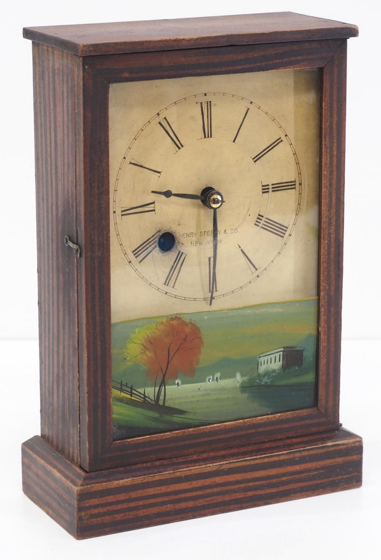 Henry Sperry & Co. Cottage Shelf Clock: Henry Sperry & Co. Cottage Shelf Clock with Grain-Painted Wood Case and Reverse Painted Glass Door of Landscape Scene Condition NOTICE! VERY IMPORTANT! Chupp Auctions is pleased to issue an opinion on
