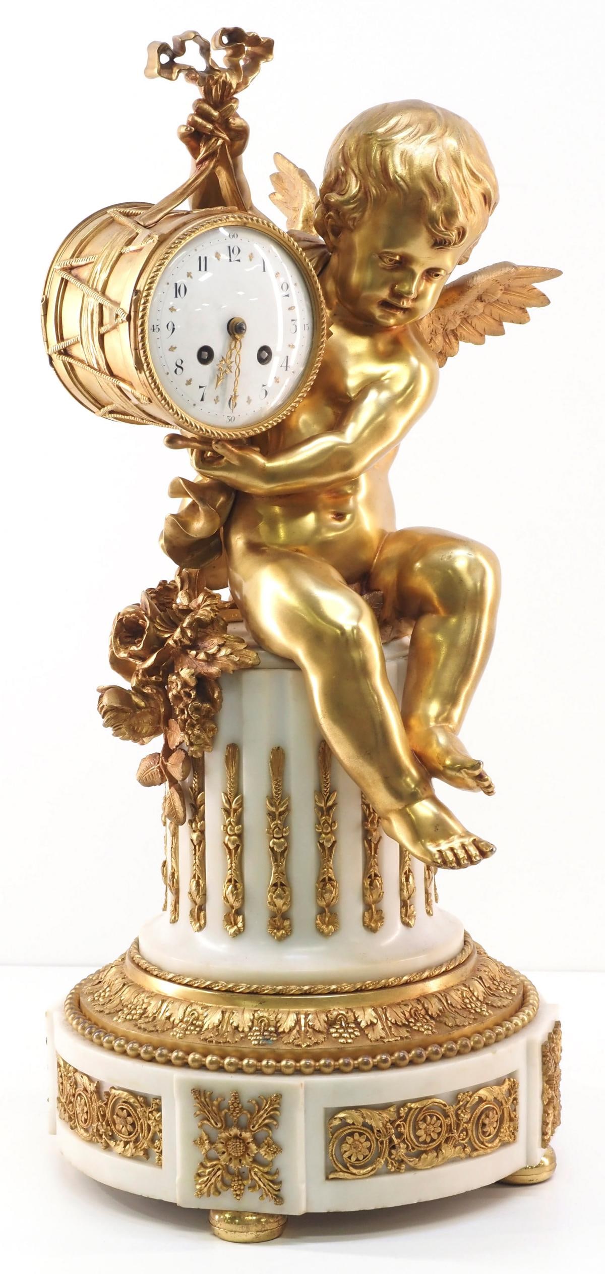 19th Century French White Marble Mantle Clock with Cupid: 19th Century French Gilt Bronze & Ormolu Over White Marble Mantle Clock of Cupid with Enamel Dial Condition NOTICE! VERY IMPORTANT! Chupp Auctions is pleased to issue an opinion on any lot; the ab