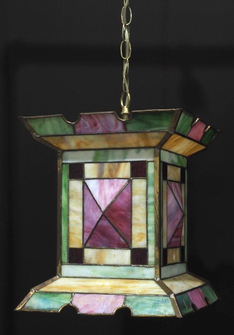 20th Century Geometric Leaded Glass Hanging Hall Light: 20th Century Geometric Leaded Glass Hanging Hall Light Condition NOTICE! VERY IMPORTANT! Chupp Auctions is pleased to issue an opinion on any lot; the absence of a condition report does not indicate t