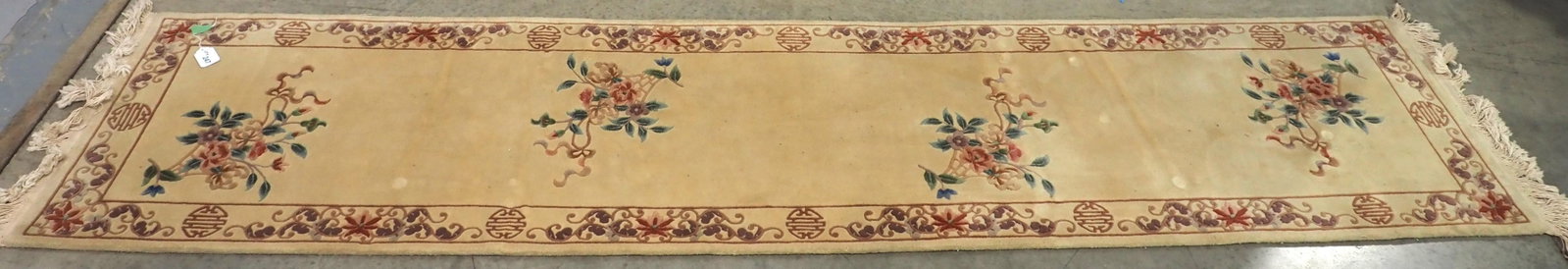 Chinese Sculpted Floral & Ivory Runner Rug: Chinese Sculpted Floral & Ivory Runner Rug, 10'3" x 27" Condition NOTICE! VERY IMPORTANT! Chupp Auctions is pleased to issue an opinion on any lot; the absence of a condition report does not indicate 