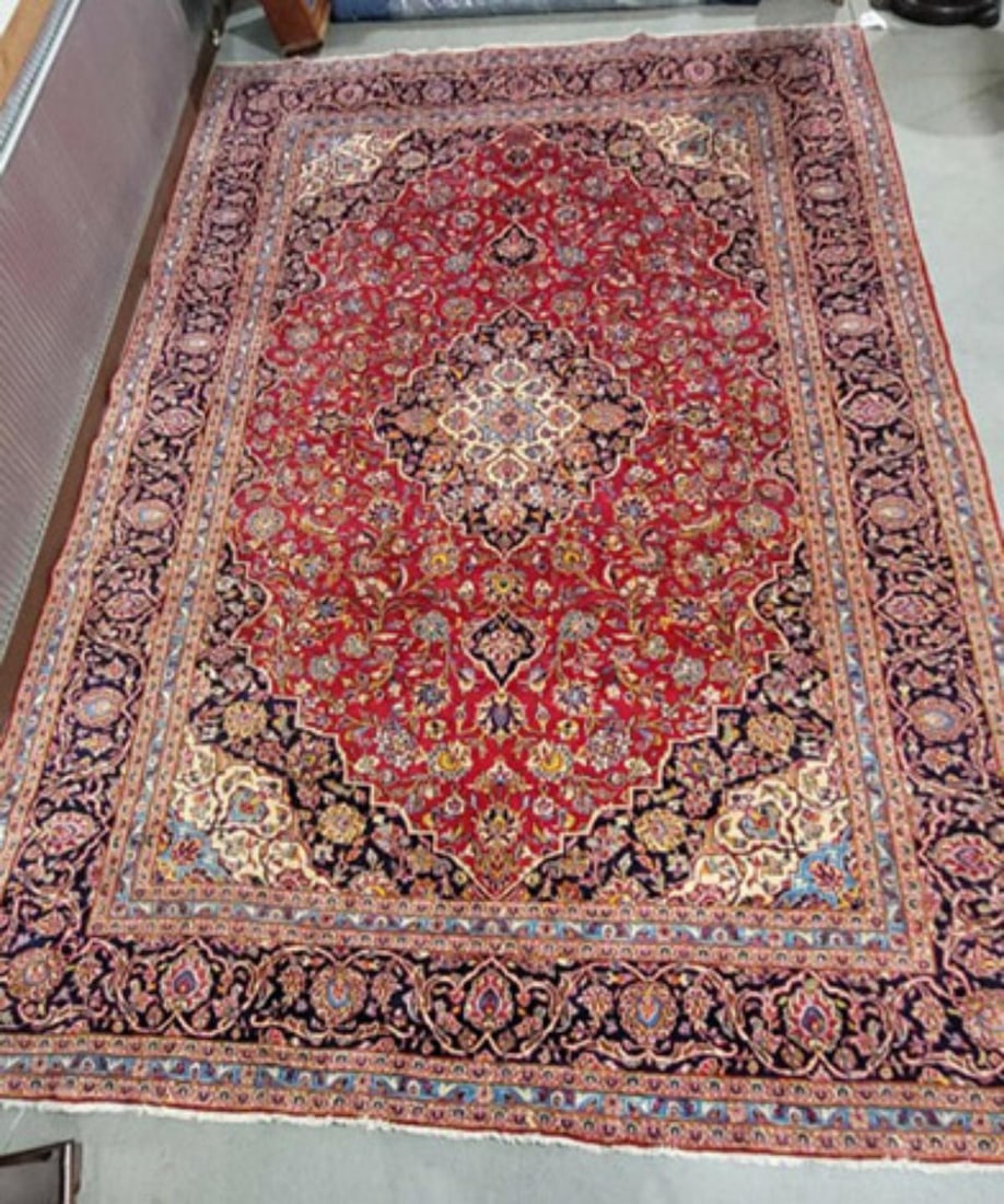 Kashan Room-size Hand Knotted Oriental Rug: Kashan Room-size Hand Knotted Oriental Rug, 14' x 9'6" Condition NOTICE! VERY IMPORTANT! Chupp Auctions is pleased to issue an opinion on any lot; the absence of a condition report does not indicate t