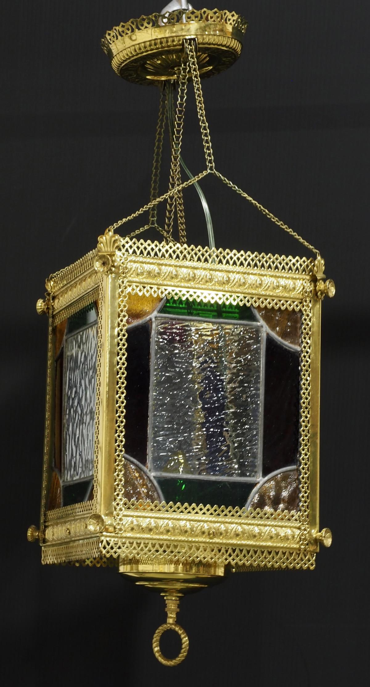Eastlake Brass Hanging Foyer Light with Leaded Glass Panels: Eastlake Brass Hanging Foyer Light with Leaded Glass Panels Condition NOTICE! VERY IMPORTANT! Chupp Auctions is pleased to issue an opinion on any lot; the absence of a condition report does not indic