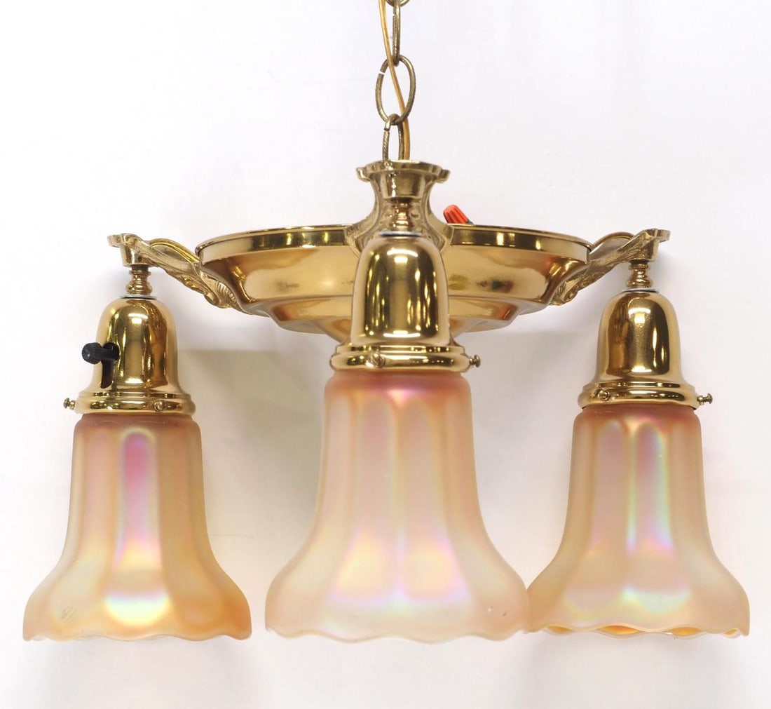 Polished Brass Hanging Pan Fixture with 4 Gold Electrolier Shades: Polished Brass Hanging Pan Fixture with 4 Gold Iridescent Electrolier Shades Condition NOTICE! VERY IMPORTANT! Chupp Auctions is pleased to issue an opinion on any lot; the absence of a condition repo