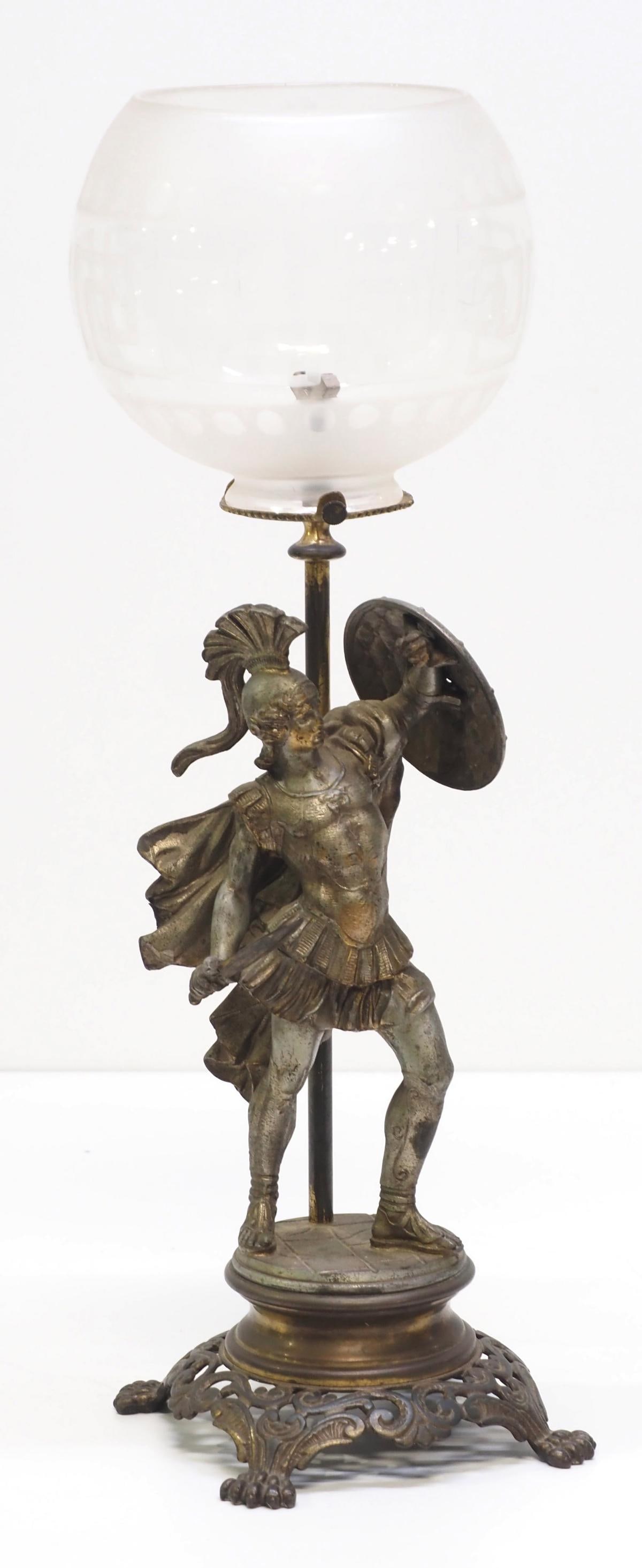 Original Gas Spelter Roman Soldier Lamp: Original Gas Spelter Roman Soldier Lamp with Greek Key Etched Shade Condition NOTICE! VERY IMPORTANT! Chupp Auctions is pleased to issue an opinion on any lot; the absence of a condition report does n
